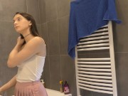 Braless hot brunette skinny and horny babe in a pink mini skirt to show her beautiful ass and legs 14/16