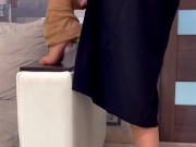 The girl takes off a nude nylon stocking from her leg 14/16