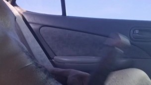Playing with my big dick in the car