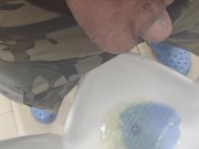 Peeing in public restroom.  Yes, the heart is tattooed. 11/16