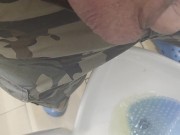 Peeing in public restroom.  Yes, the heart is tattooed. 12/16