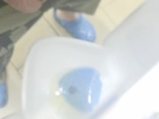 Peeing in public restroom.  Yes, the heart is tattooed. 16/16