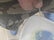 Peeing in public restroom.  Yes, the heart is tattooed. 9/16