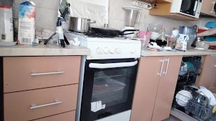 Sexy naked wife prepares food in the kitchen. Hairy brunette hair, big ass, big tits.