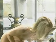 The blonde milf enjoys her eager pussy alone in the tub 14/16