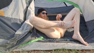 Nude camper oils up and strokes his cock for you while you watch