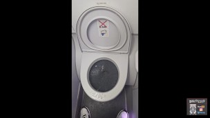 Taking a piss on a plane at a mile high