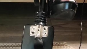 Giving a footjob in my strappy heels to a black cock on my fuck machine