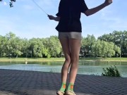 Girl jumping rope in nature 14/16