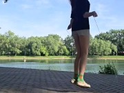 Girl jumping rope in nature 15/16