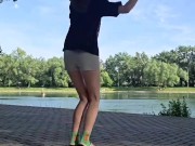 Girl jumping rope in nature 3/16