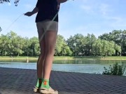 Girl jumping rope in nature 4/16