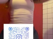 Charming girl takes off her bra from under her T-shirt 3/16