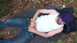 Playing with my dick in the park gets me hard and makes me cum