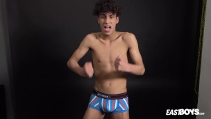 Curly twink boy shows off his slim body on webcam