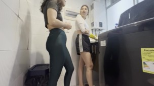 Two lesbians have a secret in the laundry room.