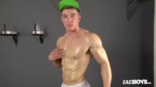 Handsome muscle boy Larry McCormick flexing and wanking
