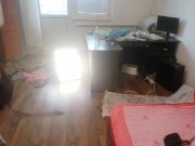 Amateur wife having fun trying on clothes that she cuts off. 11/16