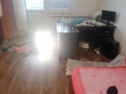 Amateur wife having fun trying on clothes that she cuts off.