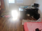 Amateur wife having fun trying on clothes that she cuts off. 7/16