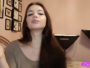 Teen latina brunette with blue eyes teases you with slow, seductive smoking 7/16