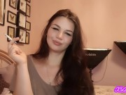 Teen latina brunette with blue eyes teases you with slow, seductive smoking 8/16