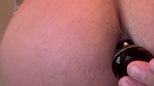 Butt plug with butt piercing