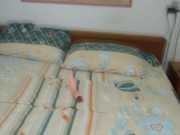 At the beach, stepmother, lacking a cock, enjoys her two huge dildos