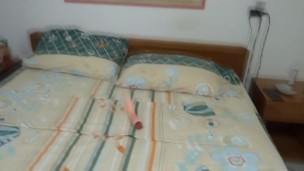 At the beach, stepmother, lacking a cock, enjoys her two huge dildos