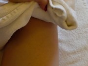 The guy finished the girl right on her foot and she wipes it with a towel 7/16