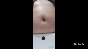 Back from work and she fingers my belly button while laying next to her