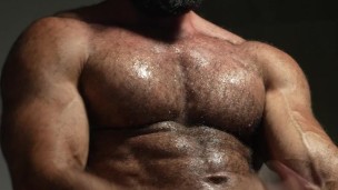Hairy bearded muscle man with an uncut big dick