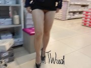 micro dress without panties in a shoe store